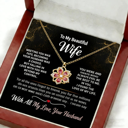 Laxrue“A necklace and pendant in the shape of a 360-degree rotating bauhinia flower, inlaid with cubic zirconia, elegant and exquisite.