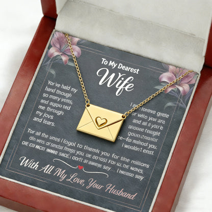 Laxrue“Customizable envelope necklaces containing secret messages, personalized photos, and necklaces.